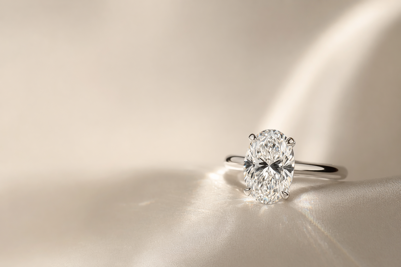 Custom oval lab-grown diamond engagement ring catching natural light
